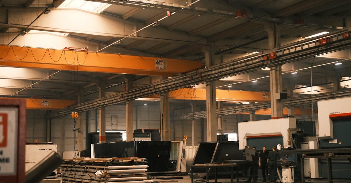 Factory floor showing the seven wastes of lean manufacturing with color-coded waste identification zones