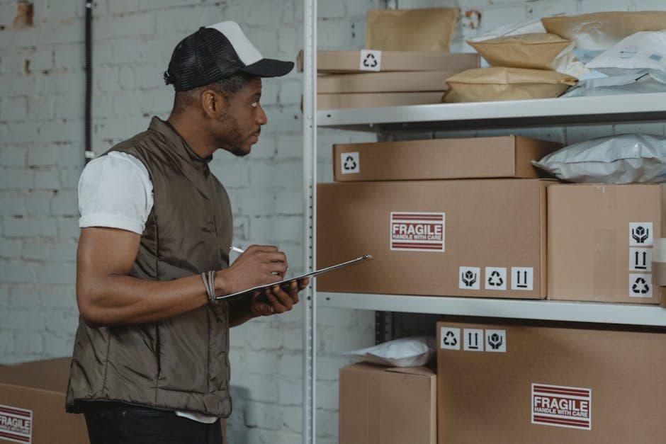 Workers processing shipments in a warehouse fulfillment center