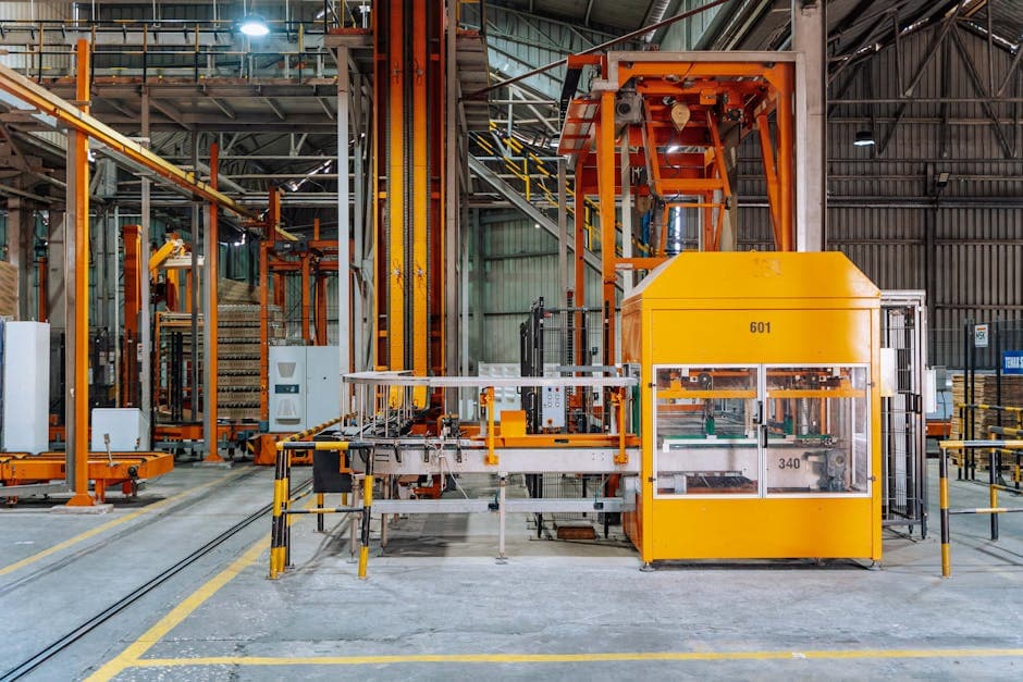 Industrial machinery on a factory floor representing equipment performance measurement