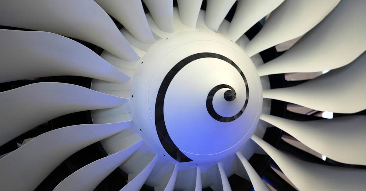 Injection molding production floor with scheduling software on a monitor