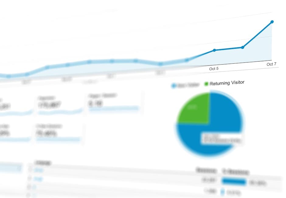 Factory floor equipment with performance metrics dashboard displayed on a monitor