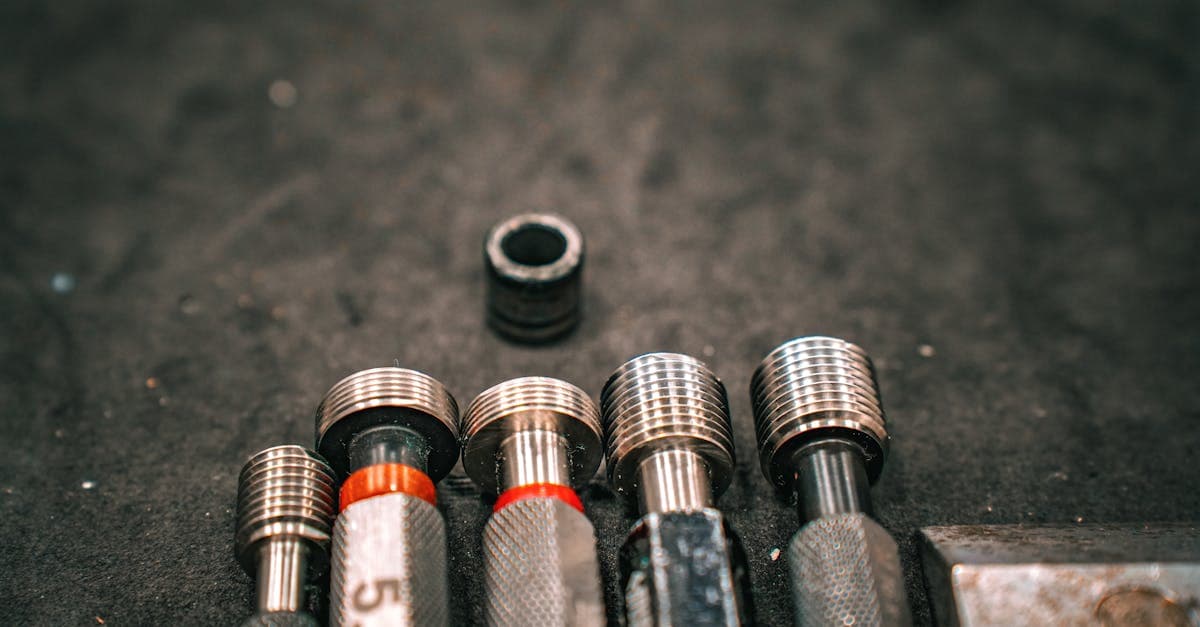 Manufacturing team conducting root cause analysis with fishbone diagram on whiteboard in a production meeting
